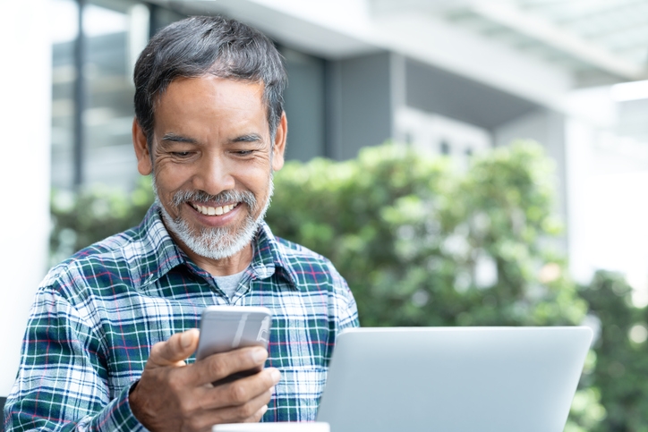 Man looking at smartphone